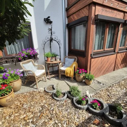Gepflegte Erdgeschoßwohnung mit Wintergarten und Terrasse - Bild 2