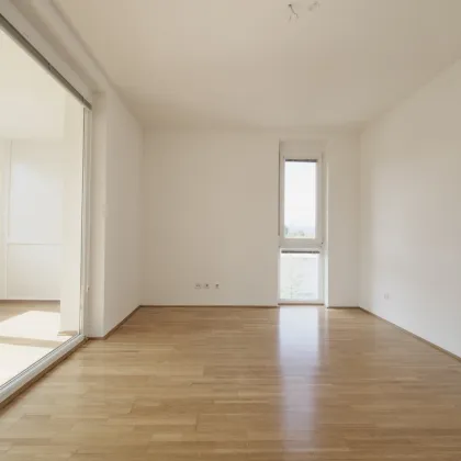 Exklusive Dachgeschoss-Maisonette mit supergroßer Terrasse und wunderbarem Fernblick & Tiefgaragenparkplatz - Bild 3