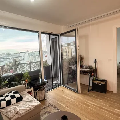 Neuwertige 2-Zimmer-Wohnung mit südöstl. Balkon und opt. Garagenstellplatz! - Bild 2