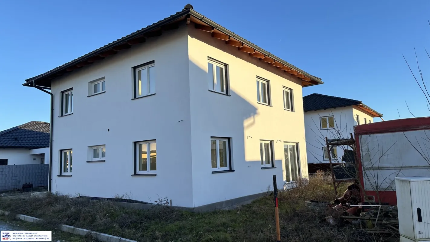 Traumhaftes Einfamilienhaus – Erstbezug mit Garagen! - Bild 1