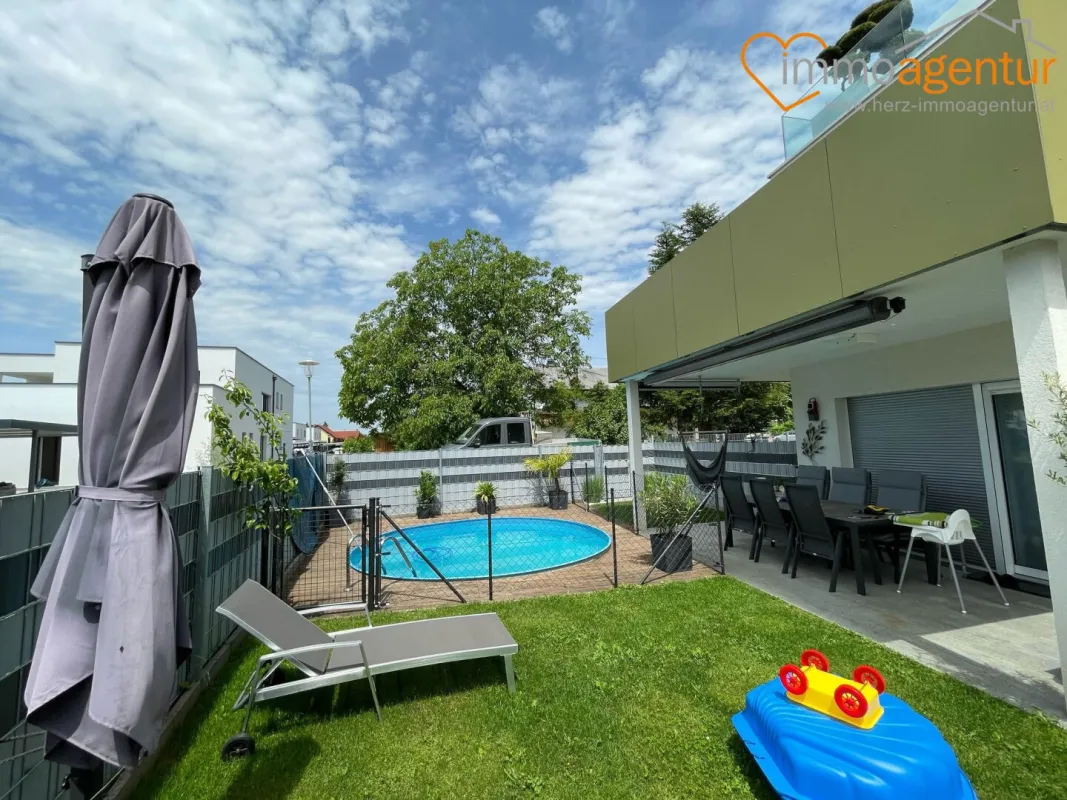 Wohnkomfort zum Wohlfühlen! Einziehen, wohlfühlen, genießen, modernes Wohnen mit Pool & Garten - Bild 1