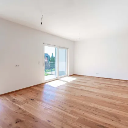 Erstbezug: Reihenmittenhaus mit Terrasse, hochwertiger Ausstattung und Finanzierungsservice - Bild 3