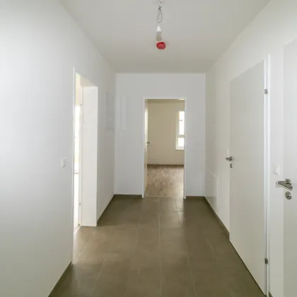 ERSTBEZUG: Erdgeschoßwohnung mit großzügigem Garten - Bild 2