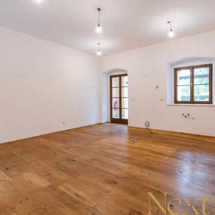 Charmante 2,5-Zimmer-Wohnung mit gemütlichem Eigengarten im Palais Löwenfeld ab sofort zu vermieten! - Bild 3