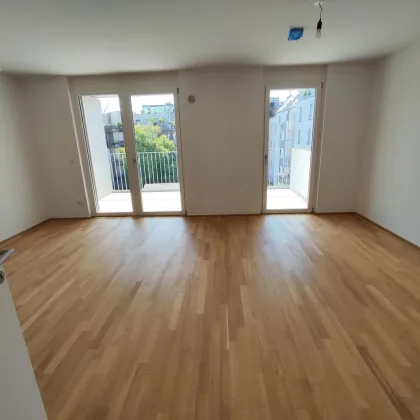 NEUBAU 3-Zimmer-ERSTBEZUG mit 2 Balkonen im 4. OG in 1210 Wien! Top 2/38 - Bild 2