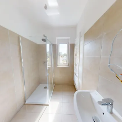 Ihr neuer Erstbezug wartet! 3-Zimmer-Wohnung mit 68,5 m² Wohnfläche und 20,5 m² Balkon im Herzen der Thermenregion – einziehen und wohlfühlen - Bild 3
