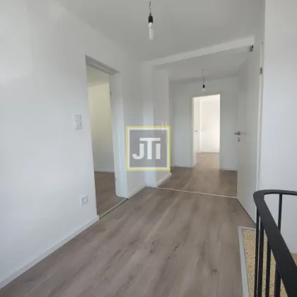 Top-sanierte 4-Zimmer-Familienoase mit großem Keller, Garage und perfekter Lage in Stockerau! - Bild 2