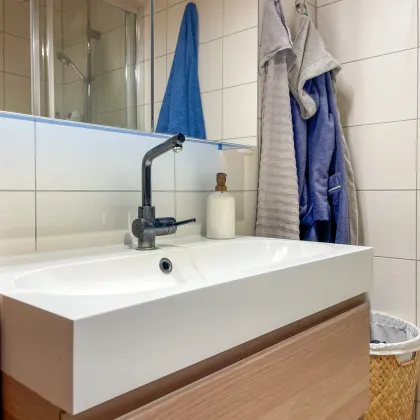Sonnig wohnen im Hochparterre – 2 Zimmer, Wintergarten & Tiefgaragenplatz - Bild 2