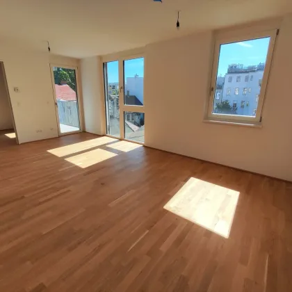NEUBAU ERSTBEZUG! 2-Zimmer-Apartment mit Balkon im 4. OG in 1210 Wien! Top 2/39 - Bild 2