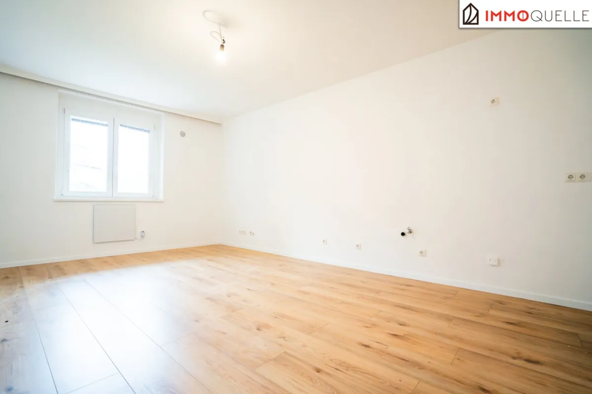 Stilvoll leben in Alland - 3 Zimmer-Wohnung in idyllischer Lage mit Grünblick - Erstbezug nach Sanierung - Bild 1
