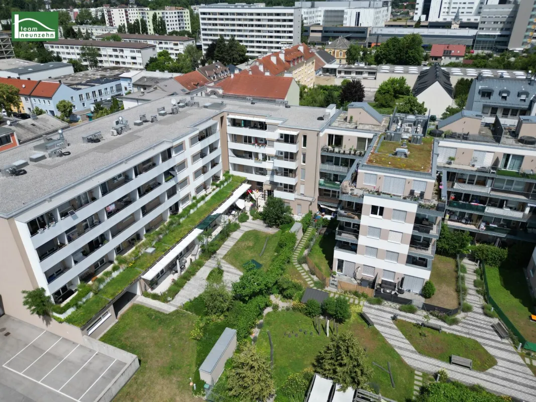 Grünblick mitten in der Stadt: 2-Zimmer-Neubauwohnung in Hofruhelage - Bild 1