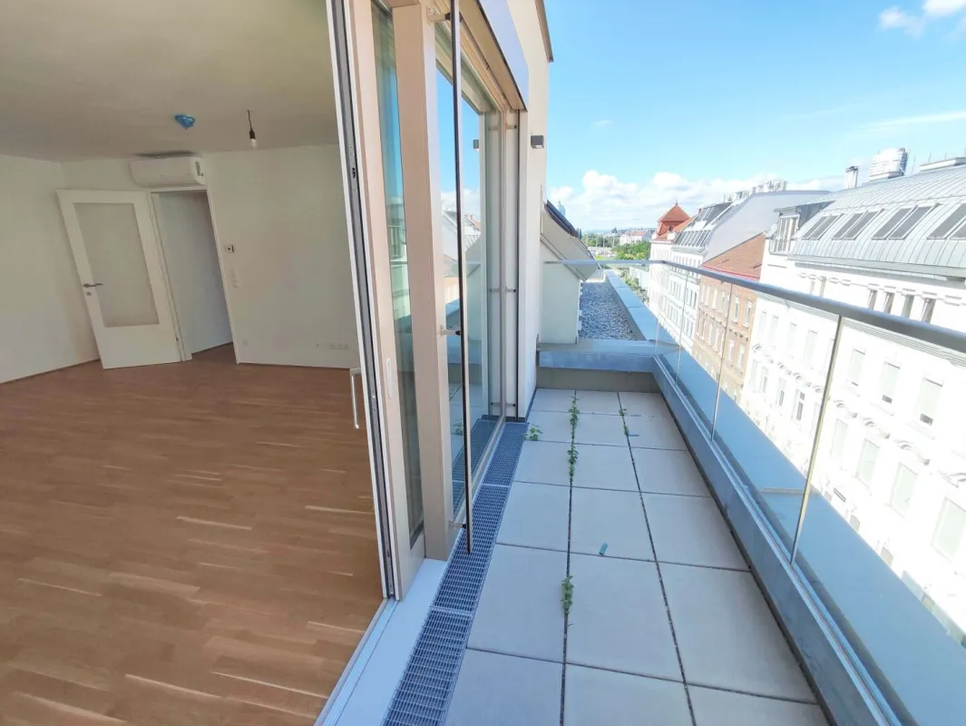NEUBAU DACHGESCHOß-3-Zimmer-ERSTBEZUG mit Balkon in 1210 Wien! Top 2/43 - Bild 1