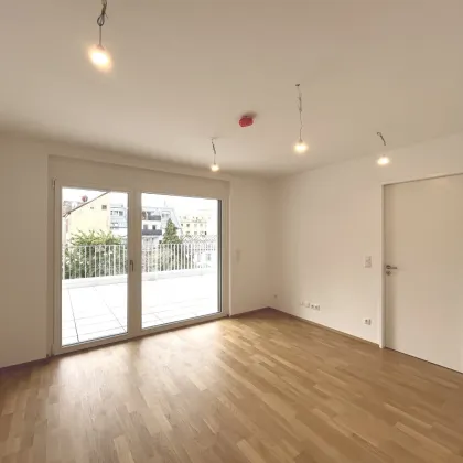 1180! TERRASSENTRAUM im ERSTBEZUG! Schöne 2-Zimmer Wohnung mit  toller Terrasse und Tiefgaragenplatz! - Bild 2