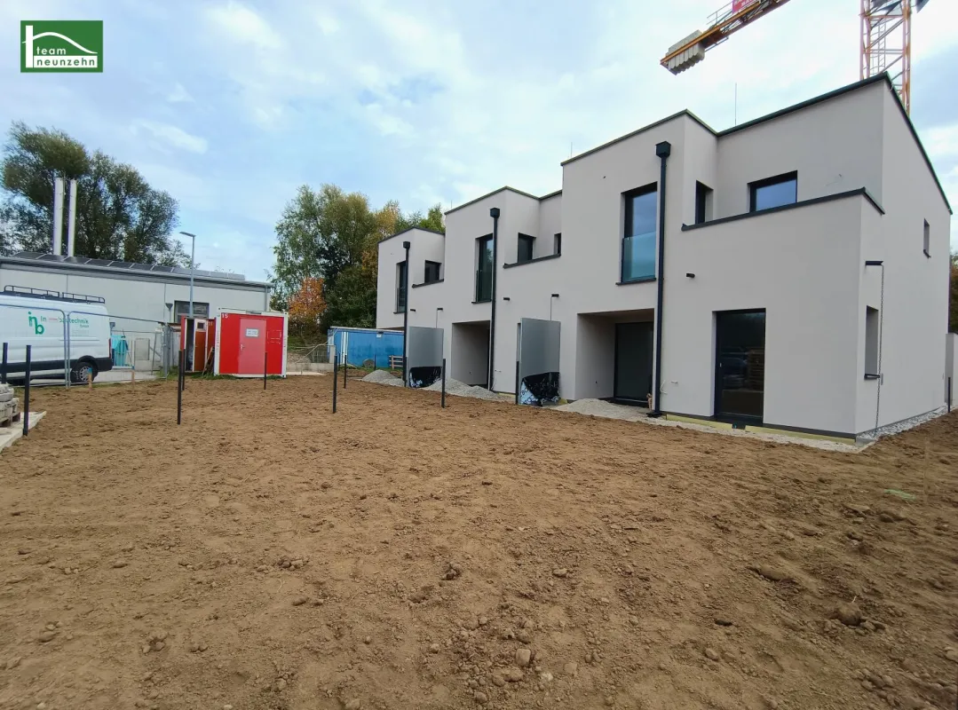 Eckreihenhaus mit tollen Außenflächen - Stadt trifft Natur - Eigengarten + Terrasse + 2 Balkone! - Bild 1