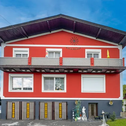 Großzügiges Mehrfamilienhaus mit vielseitigem Wohnkonzept und charmantem Gartenparadies - Bild 2