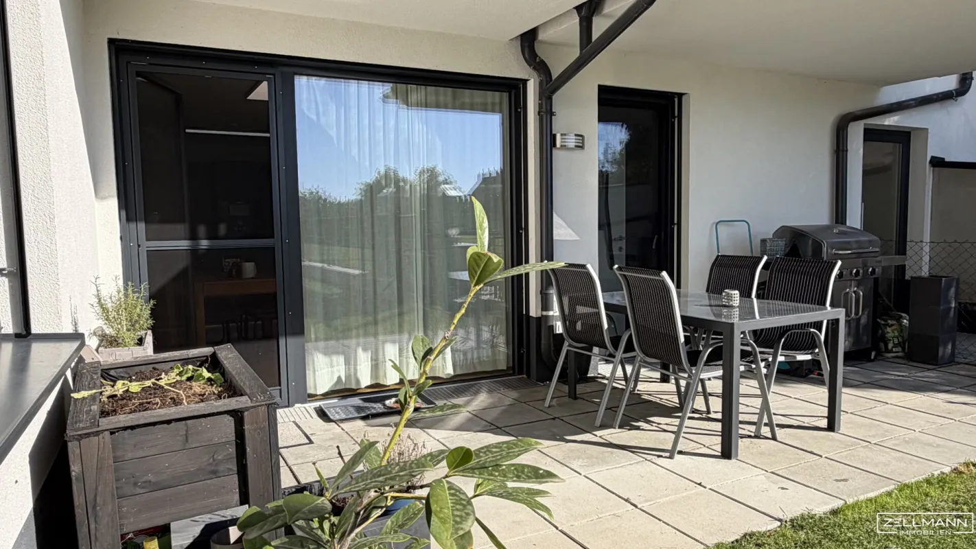 „Modernes Wohnerlebnis mit Stil – Gartenwohnung mit außergewöhnlicher Küche und luxuriösem Bad“ | ZELLMANN IMMOBILIEN - Bild 1