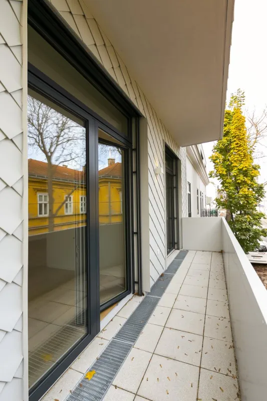 2 ZIMMER NEUBAUWOHNUNG TRIFFT AUF ALTBAUSCHICK MIT BALKON - ST. VEIT GASSE - Bild 1