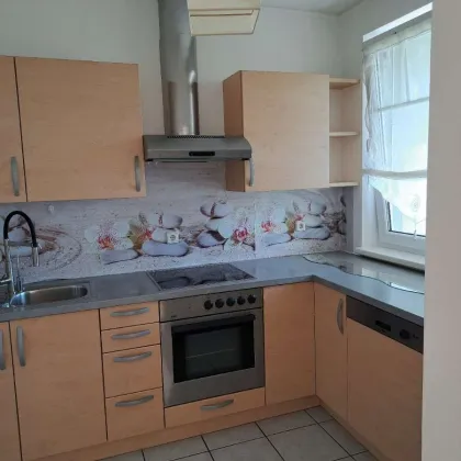 Gepflegte Terrassenwohnung 14 m² Terrasse in Hirtenberg: 51m² mit Balkon und Stellplatz! - Bild 2