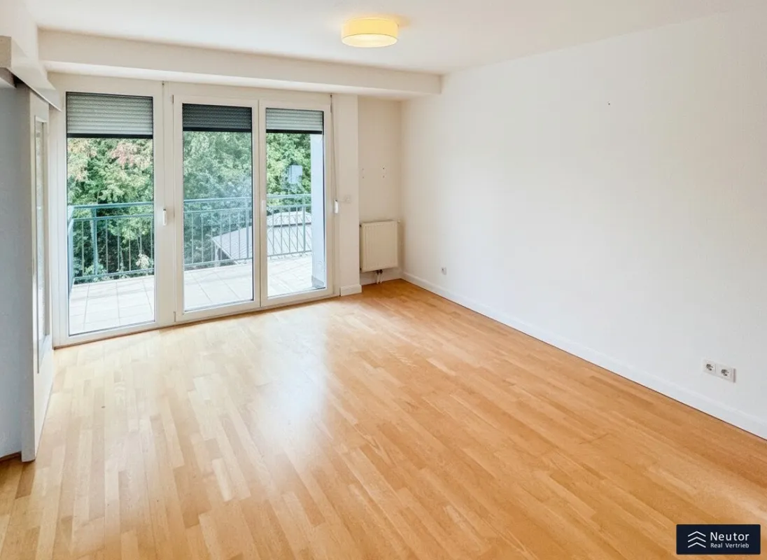 ERSTBEZUG - TERRASSEN WOHNUNG MIT GARAGE - GRÜNRUHELAGE - IM HERZEN DES 23. WIENER GEMEINDEBEZIRK - Bild 1