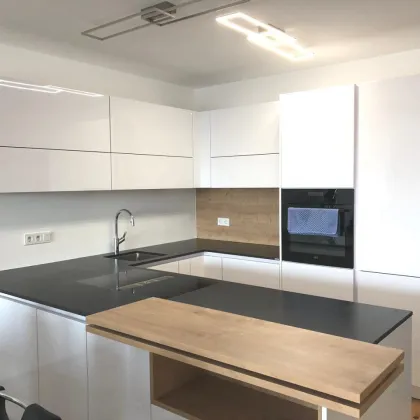 Moderne Anlegerwohnung mit Loggia und Tiefgaragenplatz - Bild 3
