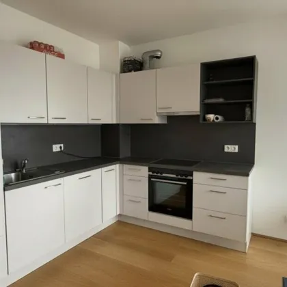 Sonniges Wohnen über den Dächern – 2 Zimmer mit Balkon & Dachterrassen-Highlight - Bild 3