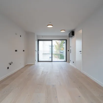 Urbaner Wohnkomfort mit Charme und Grünblick – stilvolle 3-Zimmer-Wohnung mit Balkon in ruhiger Innenhoflage - Bild 2