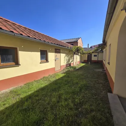 Wohnen, Arbeiten, Genießen – vielseitiges Zuhause in Vierkanthof-Struktur mit begrüntem Innenhof - Bild 2