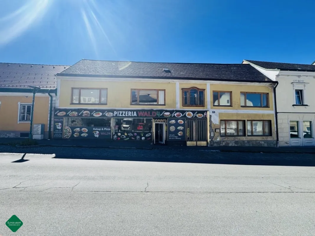Geschäftshaus mit Wohnmöglichkeiten - Bild 1