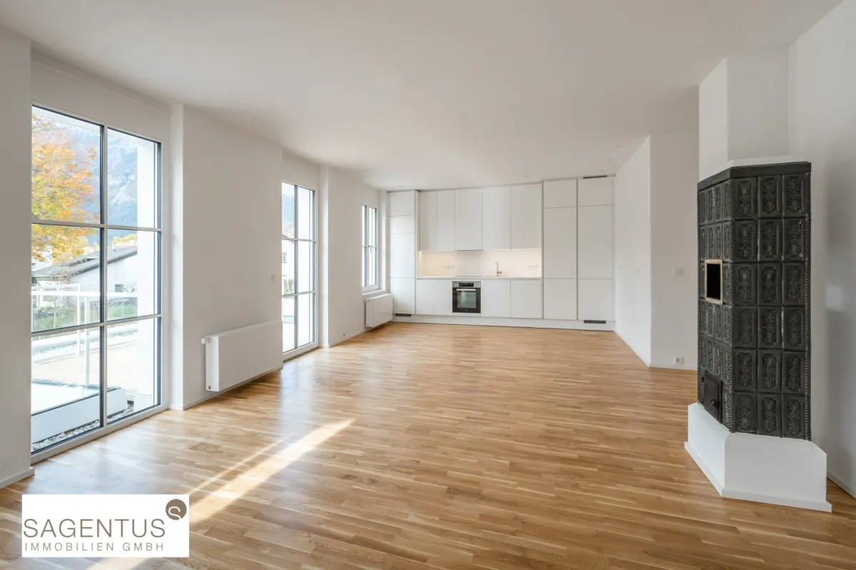 ELEGANZ TRIFFT MODERNE: Luxuriöse 3-Zimmer-Wohnung mit sonnigem Balkon inkl. Bergblick im Villenviertel zu mieten! - Bild 1