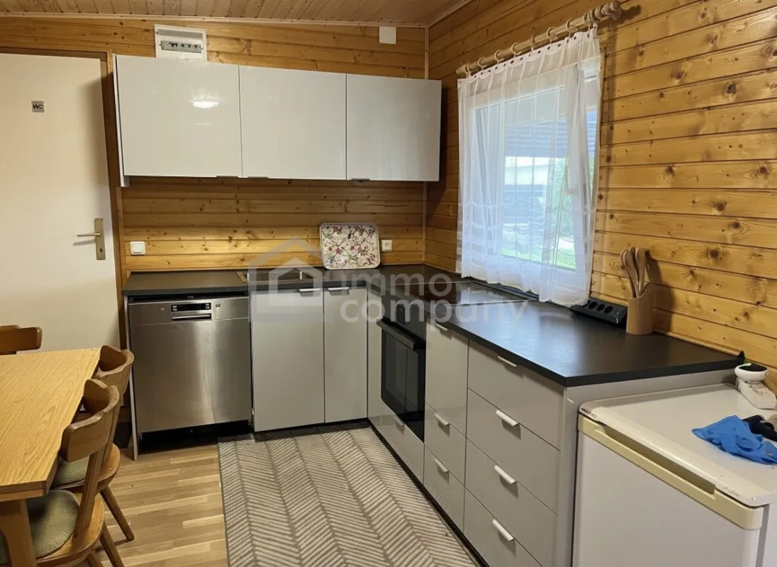 Charmantes Ferienhaus mit Seezugang am Neufelder See – ganzjährig bewohnbar - Bild 1