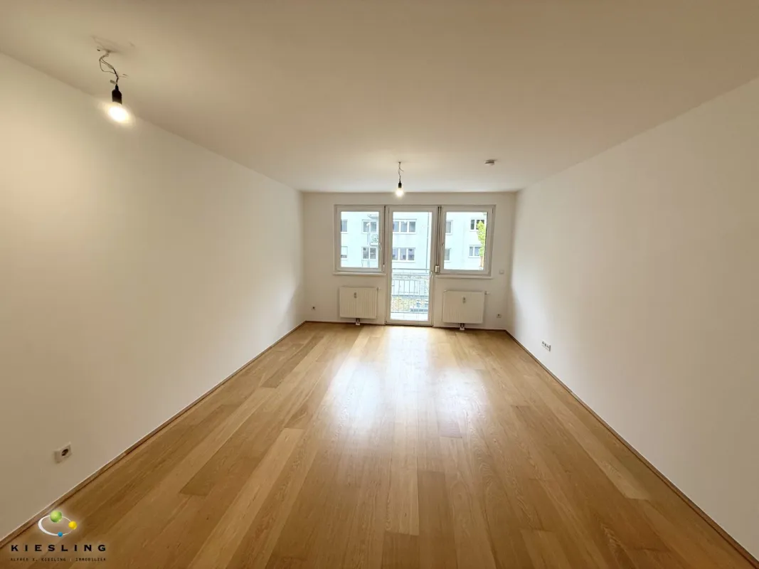 2-Zimmer-Wohnung zum Kauf - mit Balkon und Blick in den Innenhof  - Auf der Schmelz - top öffentliche Anbindung - Garagenmöglichkeit -  HaT12 - Bild 1