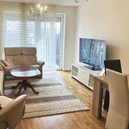 Moderne 3-Zimmer Wohnung mit Terrasse und Garten - Bild 2
