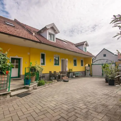 Großes Wohnhaus mit Heurigenlokal / 5 Gästezimmern und einem Miethaus - Bild 2