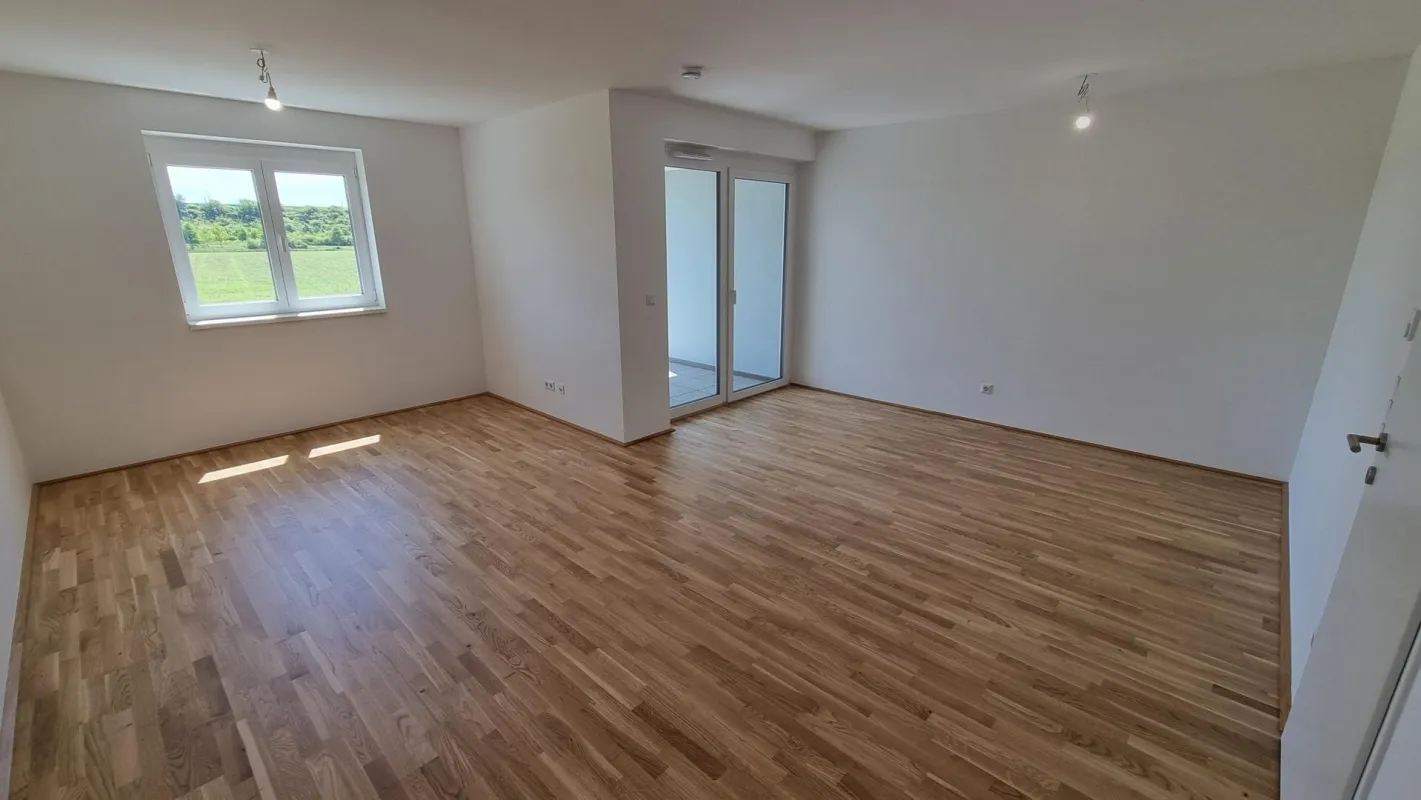 unbefristete 3-Zimmer-Neubau-Mietwohnung mit Balkon & Kaufoption - Bild 1