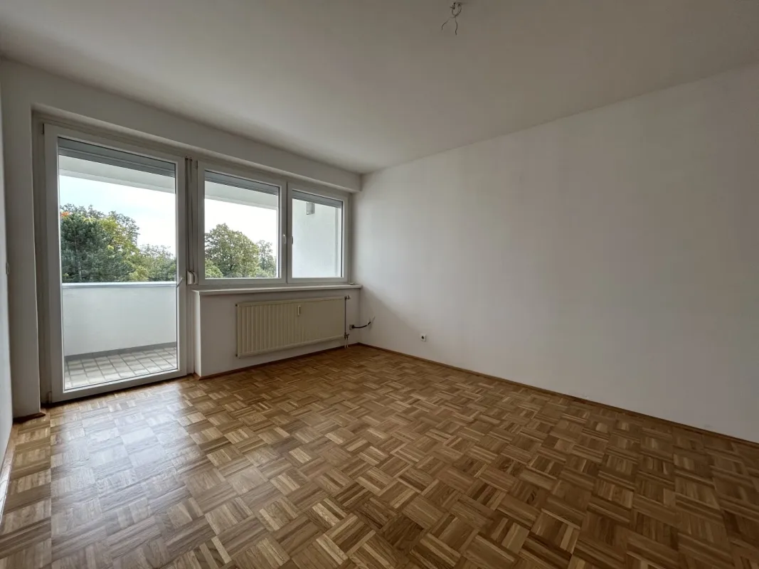 WOHNEN IN TRAUN - 3-ZIMMER-WOHNUNG MIT LOGGIA UND TIEFGARAGENPLATZ - Bild 1