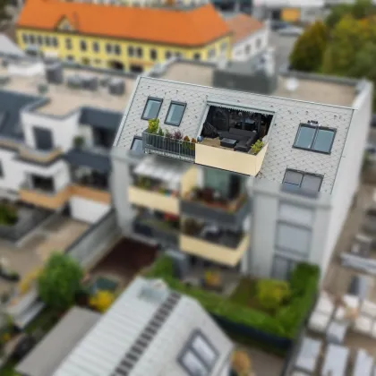 Exklusive Dachgeschosswohnung mit hochwertiger Ausstattung, Terrasse, Klimaanlage und zwei Tiefgaragenplätzen – 1220 Wien - Bild 2