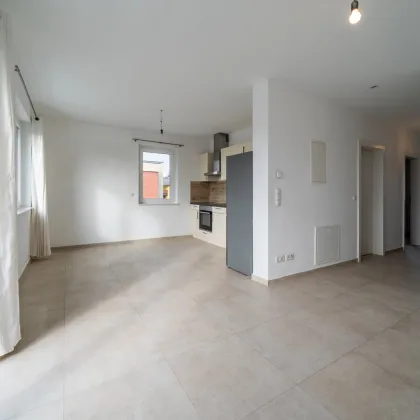 direkt im Herzen von Strasshof: moderne Wohnung mit Balkon und hochwertiger Ausstattung *sofort bezugsbereit - Bild 3
