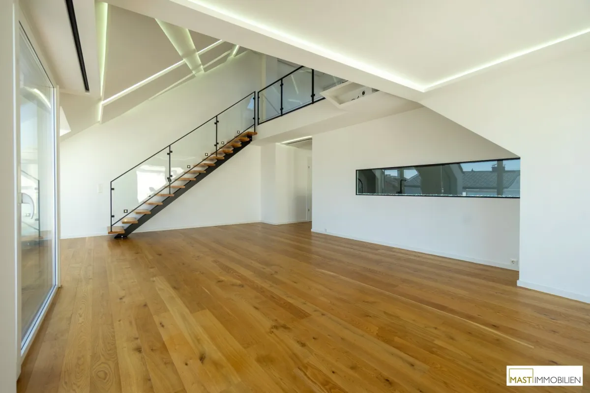 NEUER PREIS - 590.000,-- € / DG Wohn(T)raum direkt in Stockerau - Einziehen und Wohlfühlen + ca. 55 m² große Dachterrasse - Bild 1