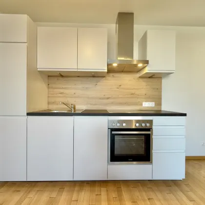 LOGGIA-HIT mit Einbauküche - BJ 2020 - Erstbezug - 2 Zimmer - ca. 58m² NFL - 1. Liftstock - Bild 3
