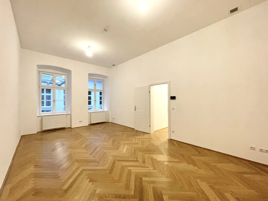 Stilvoll sanierte Altbauwohnung in bester Innenstadtlage – Ruheoase am Getreidemarkt - Bild 1