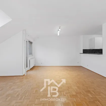 Exklusive Dachgeschosswohnung mit Fernblick – urbanes Wohnen auf höchstem Niveau - Bild 3