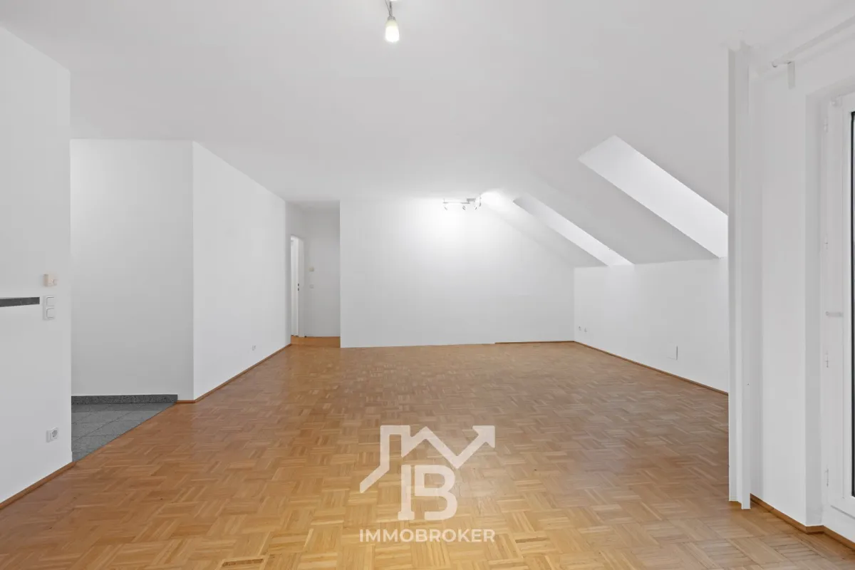 Exklusive Dachgeschosswohnung mit Fernblick – urbanes Wohnen auf höchstem Niveau - Bild 1