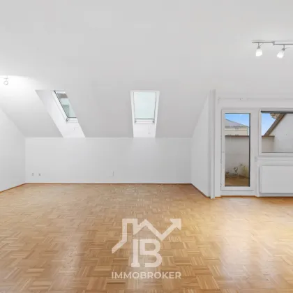 Exklusive Dachgeschosswohnung mit Fernblick – urbanes Wohnen auf höchstem Niveau - Bild 2