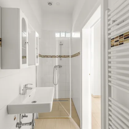 Exklusive 3-Zimmer-Wohnung – Erstbezug mit moderner Küche am Rennweg! - Bild 3