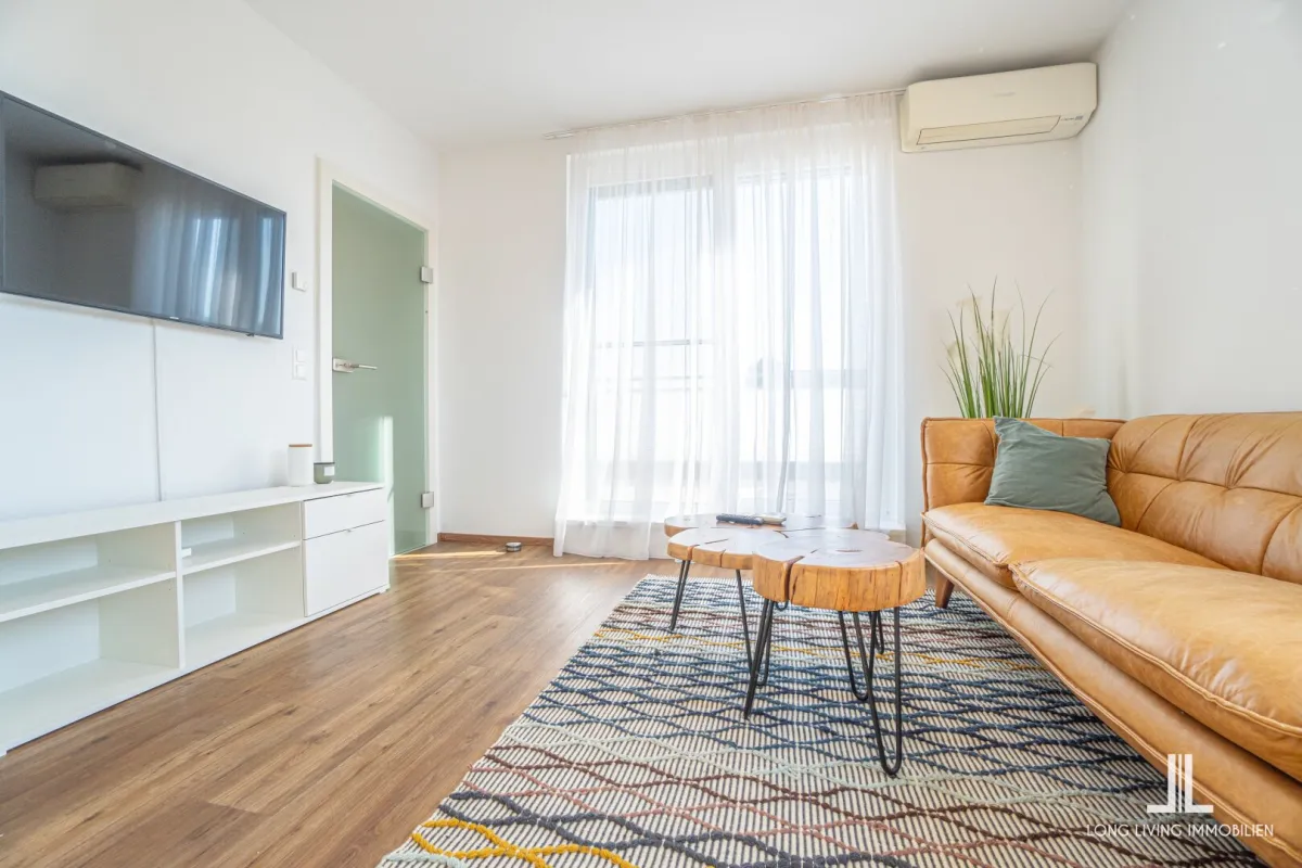 Vollmöblierte 2-Zimmer-Wohnung mit Terrasse und Tiefgaragenplatz in Raaba - Bild 1