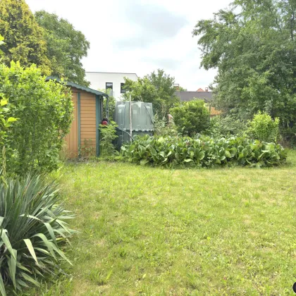 Einfamilienhaus mit Garage, schönem Garten und Teich in ruhiger Wohnlage - Bild 2