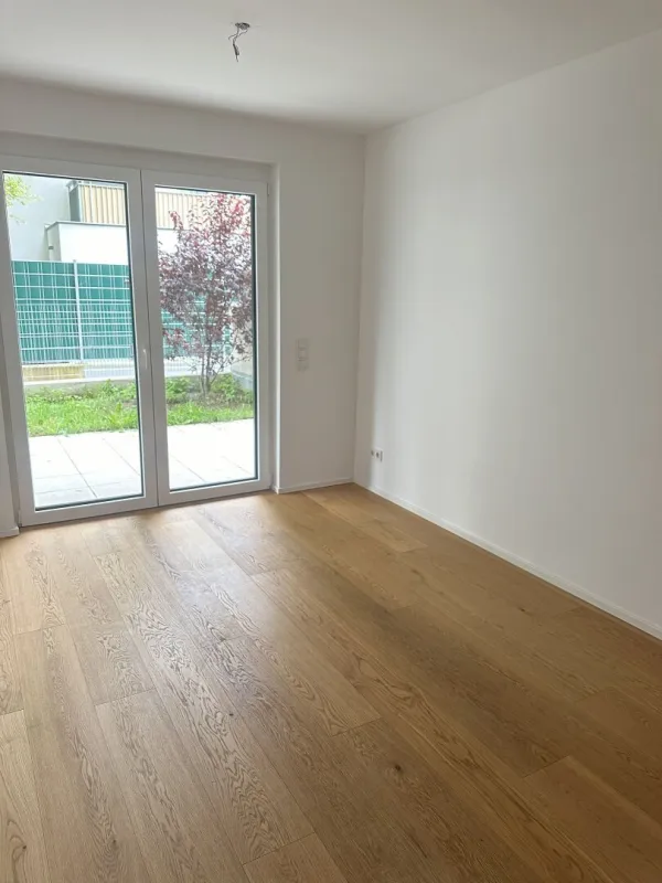 Moderne Gartenwohnung bei der Kirche Atzgersdorf. - Bild 1