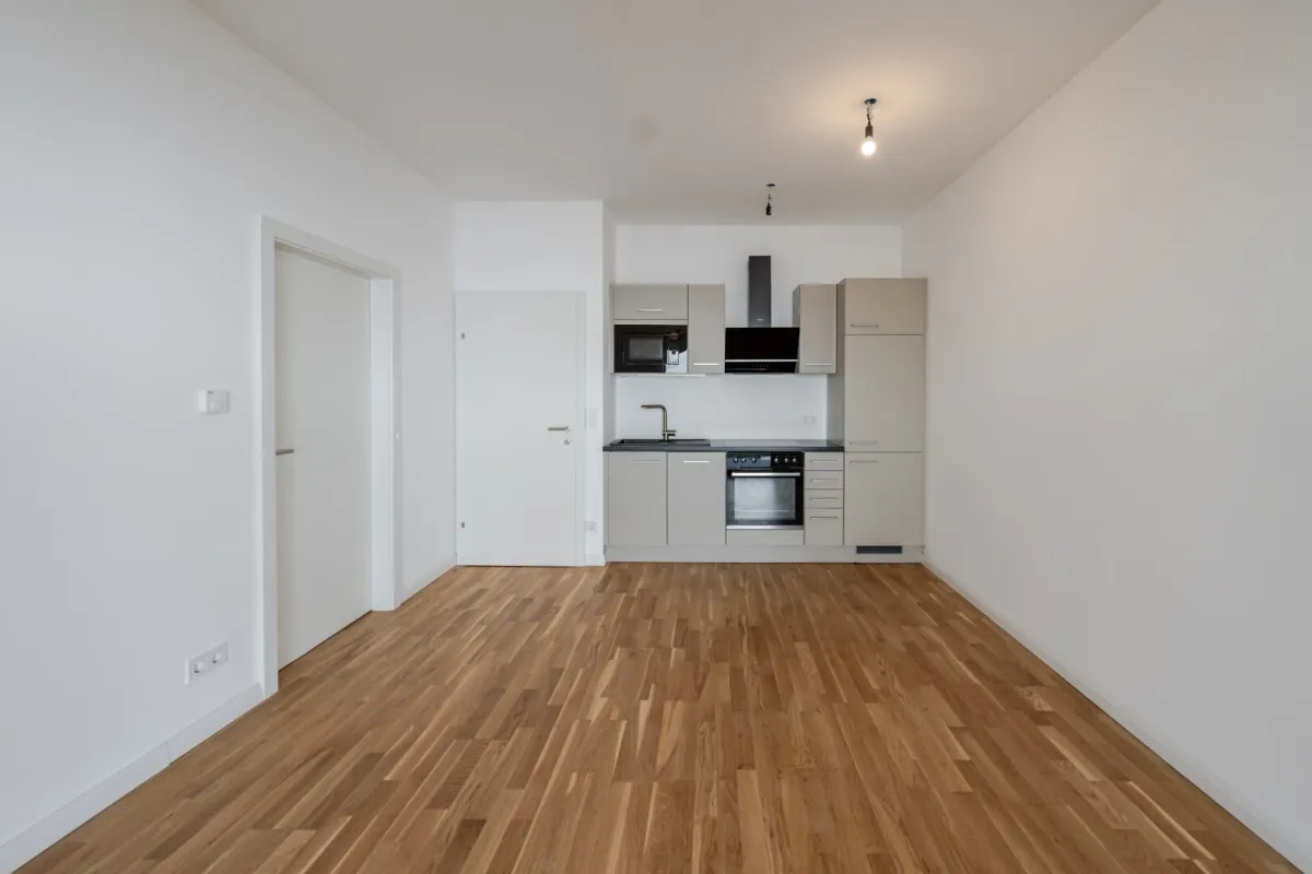 Barrierefreie Gartenwohnung mit Terrasse und Tiefgaragenparkplatz - Bild 1